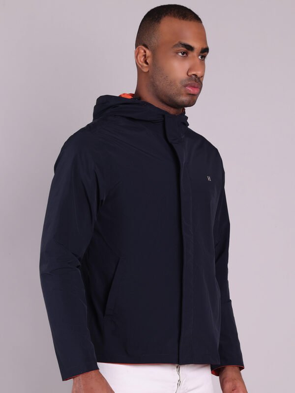 HOUSE OF VEDAS Model Wearing Navy Rust Rain Jacket for Men - Smart Design for Online Shopping in India.